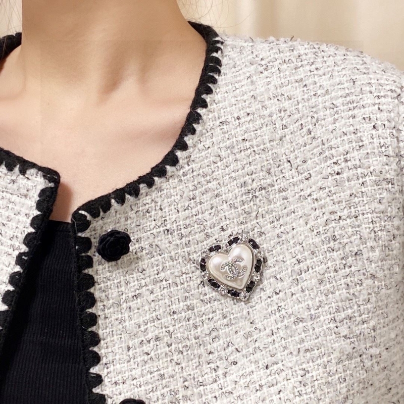 Ch*el brooches